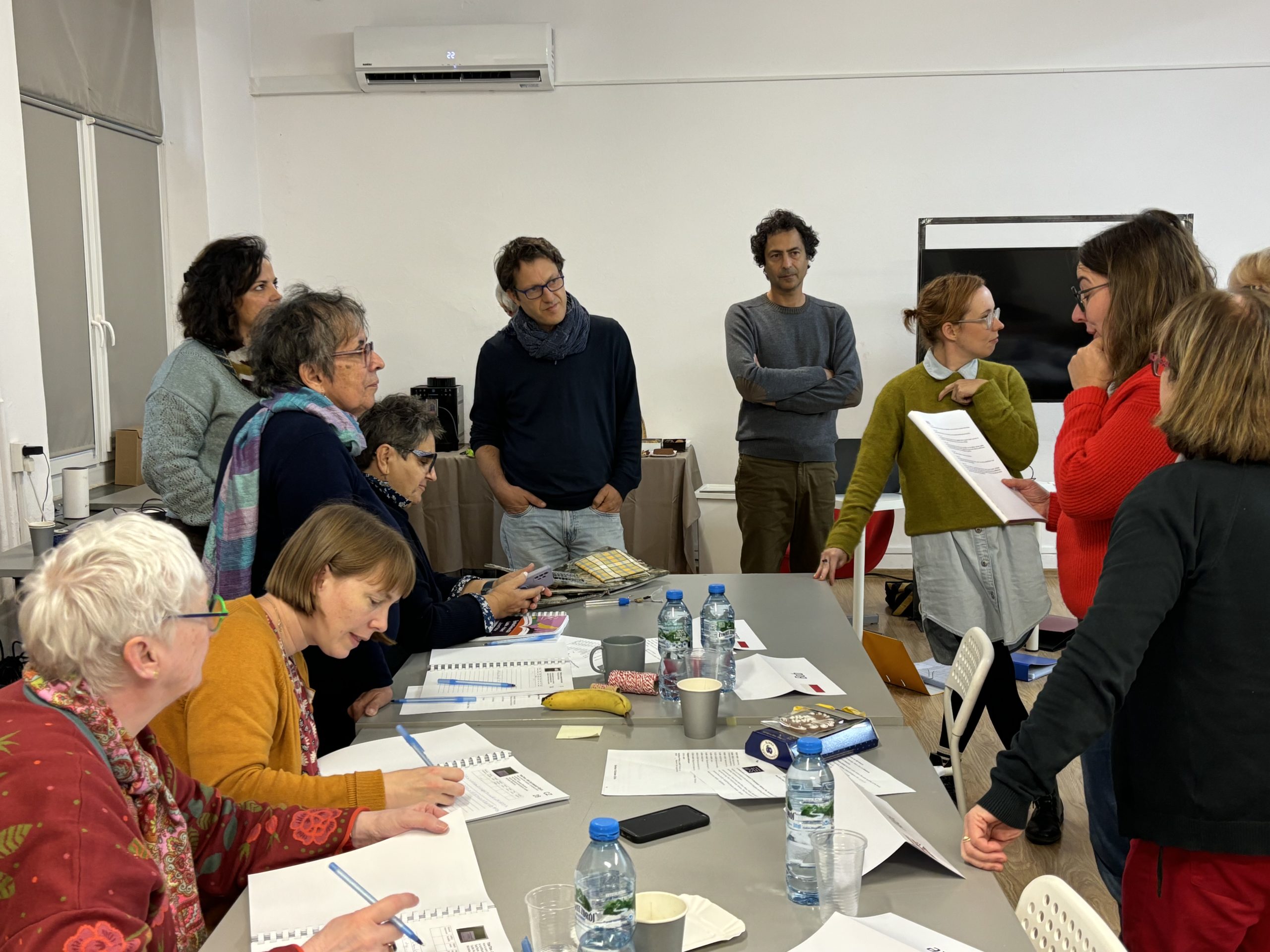 photo of some of the jury members examining the models.